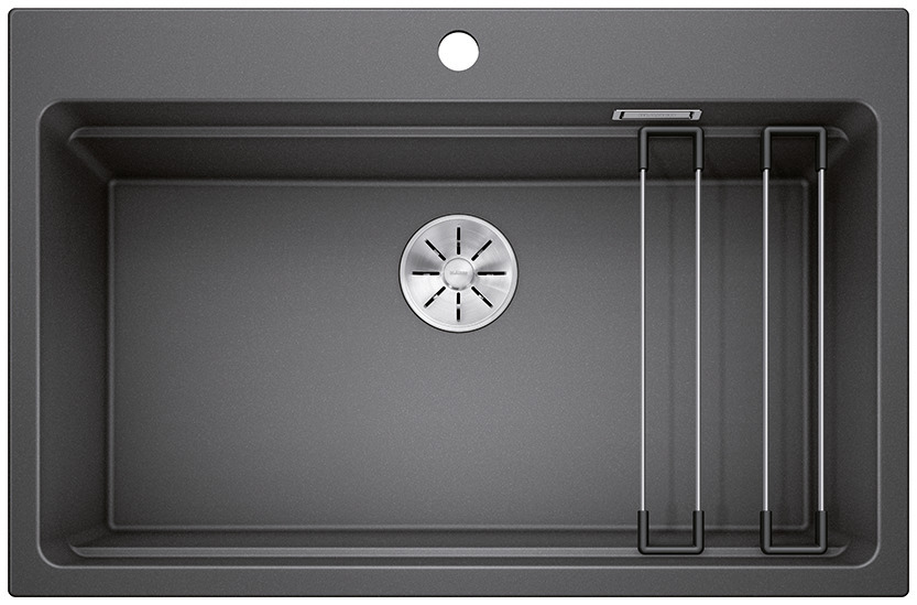 01232011_C_Web-PPT-JPG_150dpi_17041 - Τσιντώνης Πλακάκια Dark gray single-bowl kitchen sink with a centered stainless drain and a built-in metal drying rack on the right side of the basin.