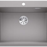 Gray rectangular kitchen sink with a round metal drain in the center and a faucet hole above the basin edge.
