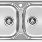 Stainless steel double kitchen sink with two basins and a central divider, top view.