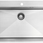 Stainless steel kitchen sink with a centered drain and a rounded mounting hole at the top edge, showing a reflective, brushed finish.