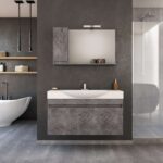 Modern bathroom with a freestanding white tub on the left, dark textured walls, and a central vanity with a large mirror.