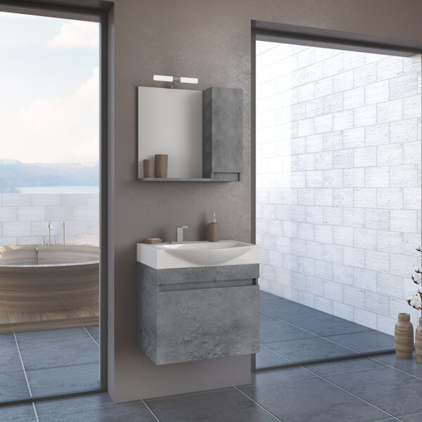 Modern bathroom with a concrete vanity and square sink, mirror, and built-in storage; large glass wall reveals an outdoor wooden tub and mountain view outside.