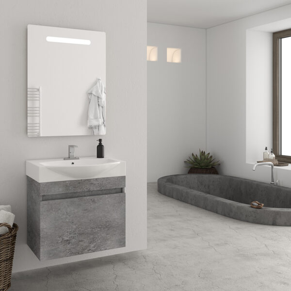 Modern bathroom with a wall-mounted concrete vanity, white sink, and towel rack; basket of towels nearby.