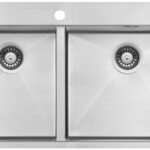 Double stainless-steel kitchen sink with two equal basins and centered basins’ drains.