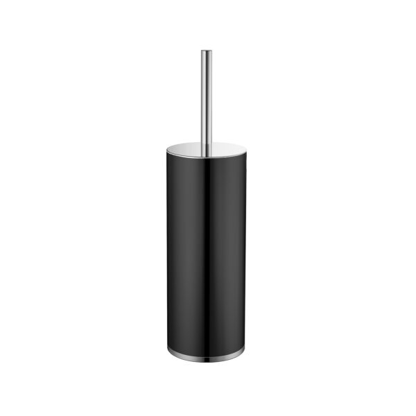 Close-up of a glossy black cylindrical pedestal with a slim chrome rod extending upward from the top.