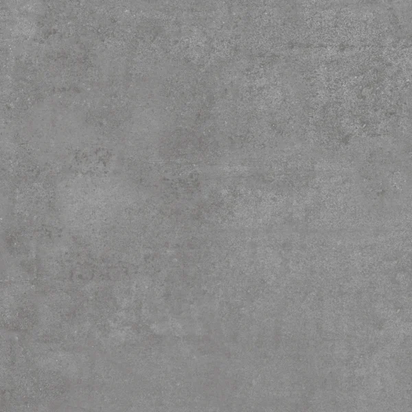 Close-up of a weathered gray concrete surface with subtle speckling and texture.