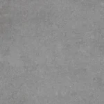Close-up of a rough, gray concrete surface with speckled texture
