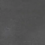 Dark gray textured concrete background with subtle speckles for a backdrop