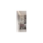 Modern bathroom with an oval backlit mirror above a pink vanity, beige-gray walls and built‑in shelves nearby.